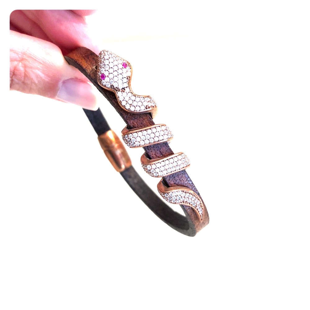 Costume jewelry. Rhinestone snake wrap on leather